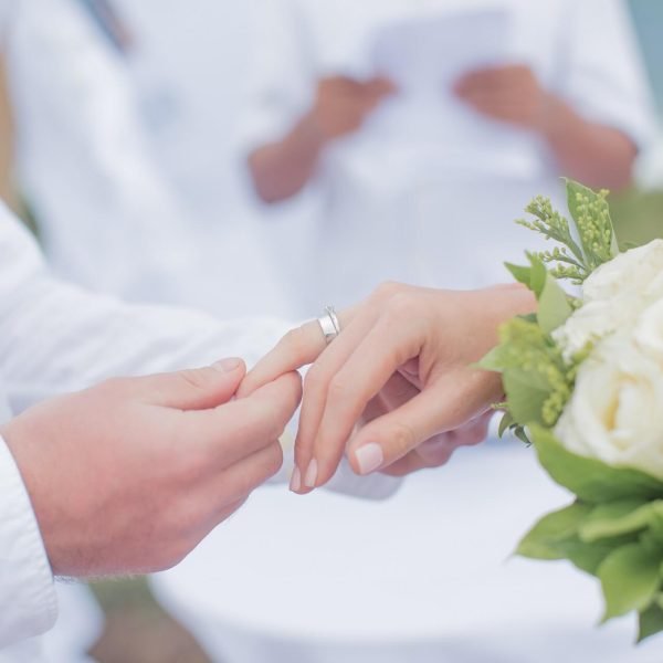 groom-wearing-ring-to-bride-during-wedding-ceremon-2022-11-14-05-04-05-utc.jpg