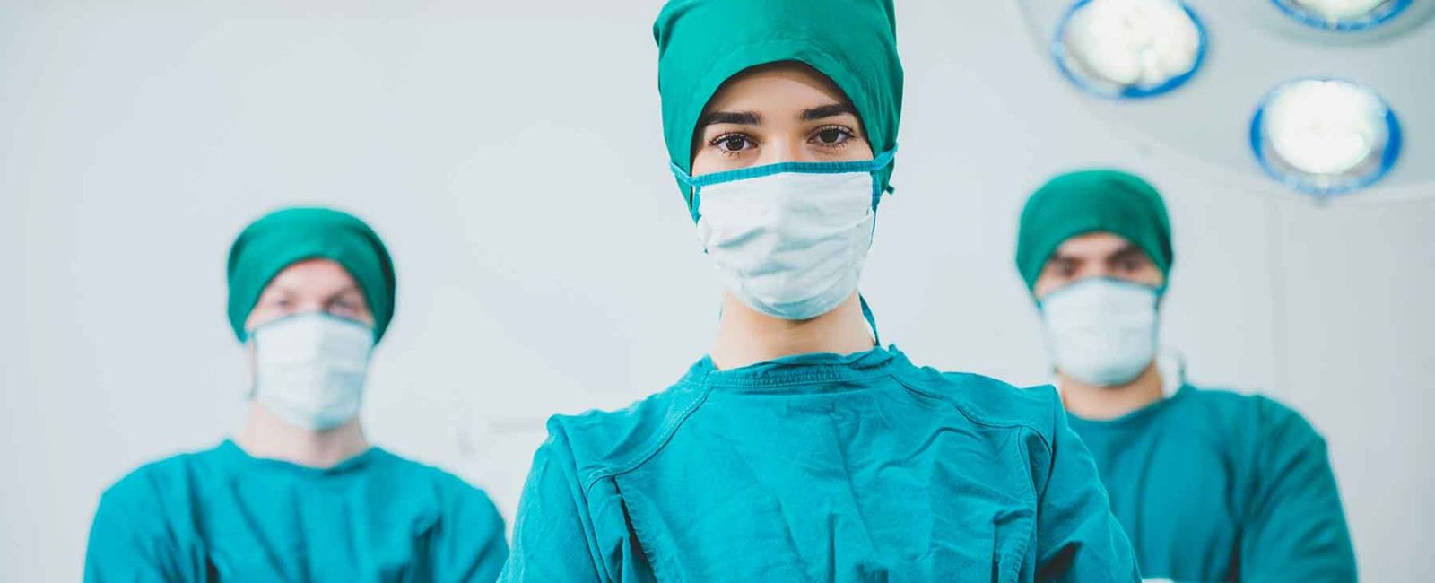 portrait-of-male-and-female-surgeon-doctors-wearin-MTBD3CF.jpg