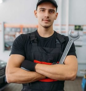 auto-mechanic-with-wrench-tire-service.jpg