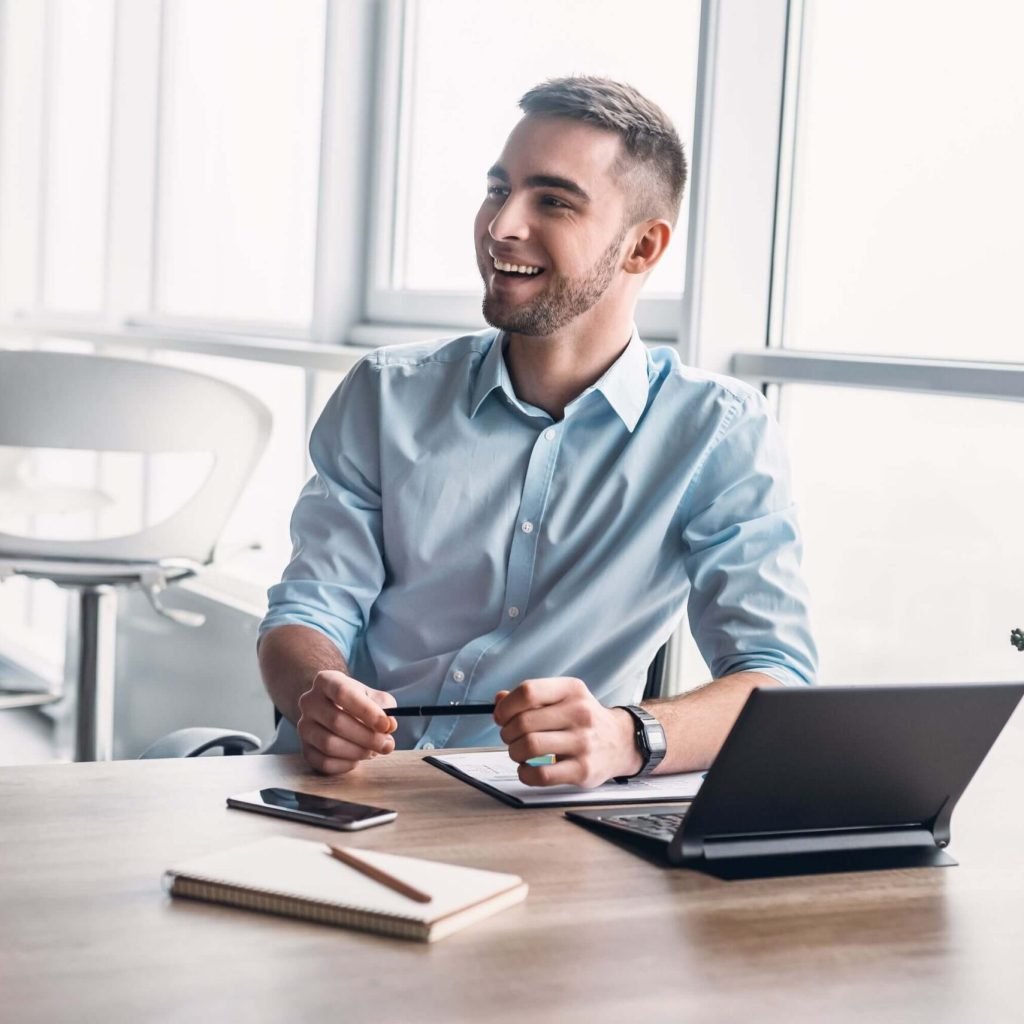 young-businessman-working-in-office-GV8QFMU-1.jpg