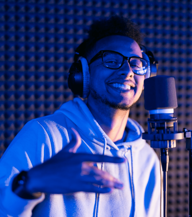 young-male-singer-in-recording-studio-performing-i-2022-05-26-22-33-29-utc.png